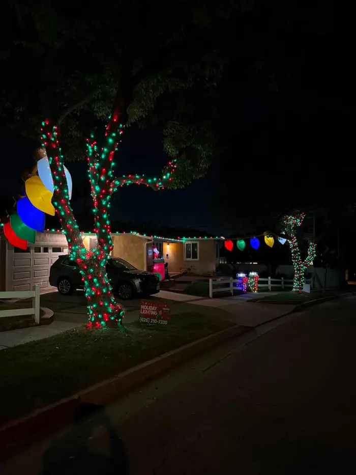Red and green tree wrap with classic Christmas display